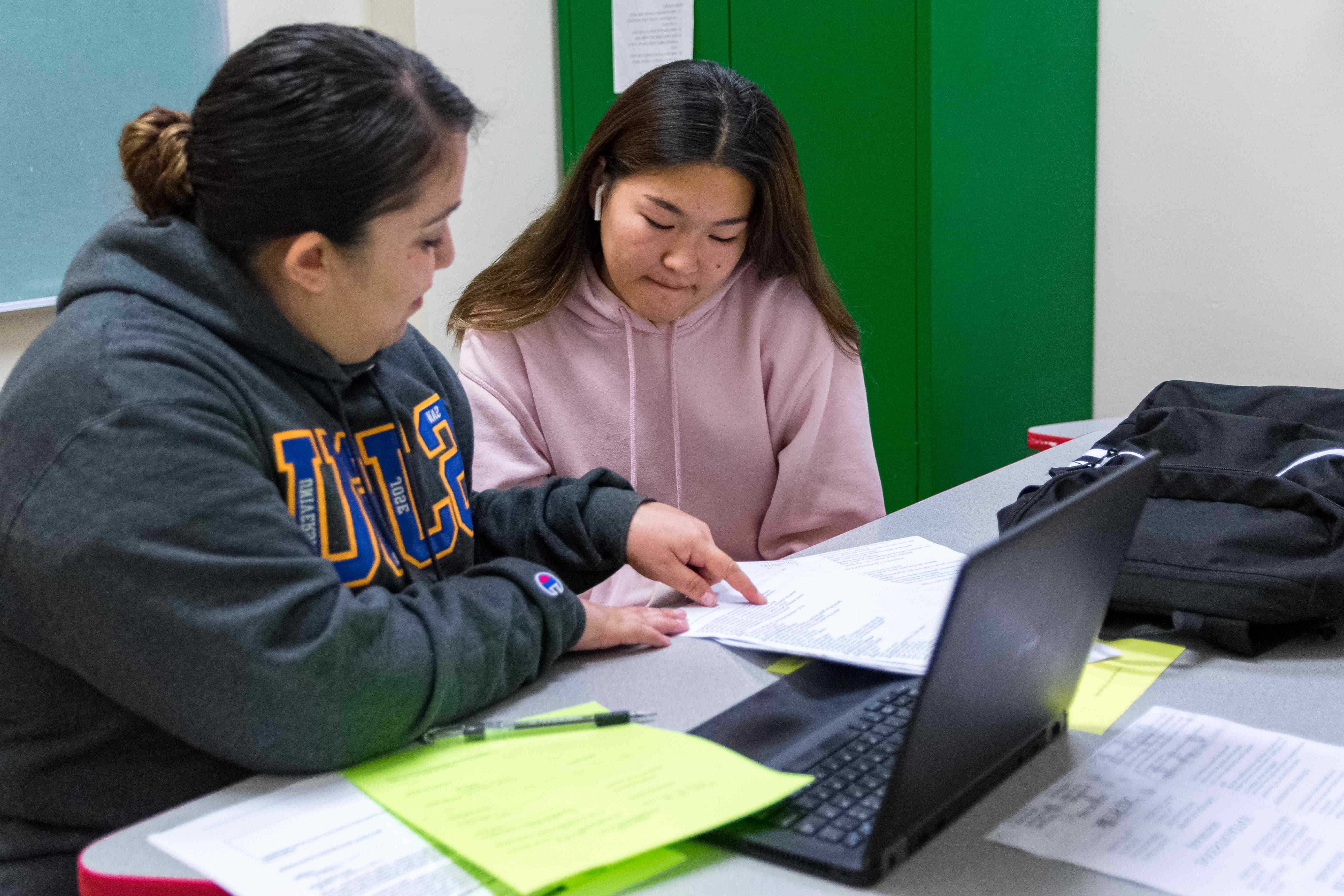 two students in counseling